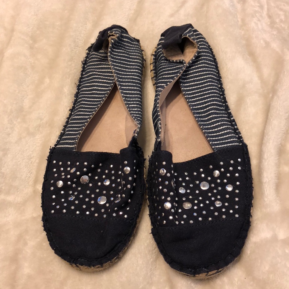 Blue flats with silver embellishments